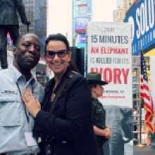 Director Jimmiel J. Mandima of the African Wildlife Foundation and Christina LaMonica in Times Square. for the second Ivory Crush on American soil in U.S. history.